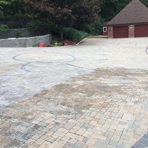 The buildup on this driveway was more noticeable than the original handwork and design